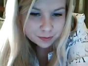 Sexy blonde plays with her tits on cam