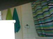 My showering stepsister unaware of spy camera