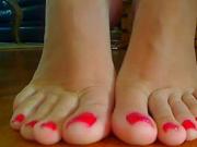 RED NAIL POLISH FOOT