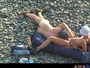 Voyeur on public beach. Oral sex