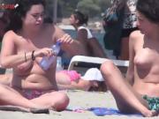 Hot topless girls on a public beach