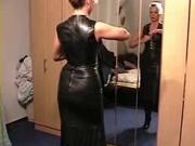 Lady putting on leather clothes