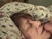 Granny lying on the couch get sperm in mouth