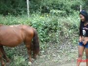 HD peeing next to horse in jungle
