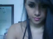 Sexy black haired babe teasing on webcam