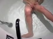 Chinese Escort touching herself in Bathtub