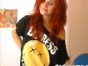 Cute redhead teen shows tits on webcam