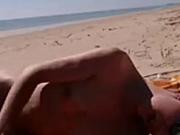 Girl masturbating by the sea