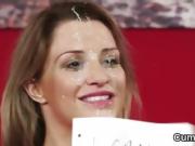 Hot babe gets cumshot on her face sucking all the load