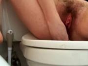 Bathroom orgasm with vibe in ass