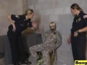 Busty cops enjoy abusing arrested black soldier