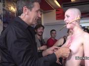 Trimmed head slave caned in public bar