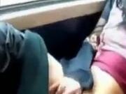 Asian milf rubs her clit on a train.