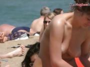 Nice brunette babe Topless on the Beach