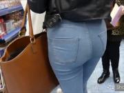 Candid blonde teen with sexy curves in jeans