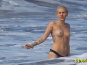 Miley Cyrus Fooling With Huge Dildo While Nude