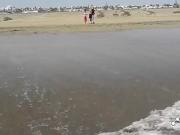 Adult woman shows her charms in the dunes