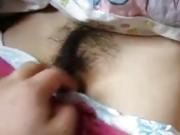Sleeping Asian gets hairy pussy fingered