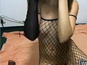 Teen In Fishnet Outfit And Heels