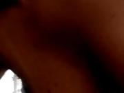 Busty masturbates with the hand brake in the car