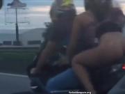 She goes on a motorcycle without panties