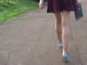 Leggy brunette teases long legs in high heel shoes fetish