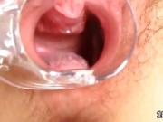 Sensual teen is gaping juicy pussy in closeup and getting off