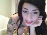 Brunette fucking with a dildo