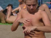 Beauty blonde babe Topless at the Beach