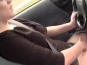 She Fingers Her Pussy While Driving