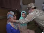 Two arab babes kissing while soldiers are watching