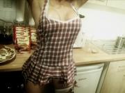 Horny couple play with food in the kitchen before having sex