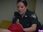 Two police officer cougars having fun with arrested man