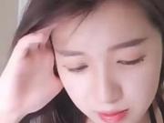 Awesome asian teen teasing at webcam