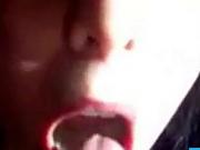 She takes the load in her mouth and swallows it all