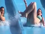 Tiny tits and ass exposed on the waterslide