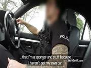 Busty redhead fucks on police car