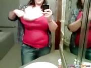 teen Plays With Her Huge Tits In Front Of The Bathroom Mirror