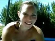 young teases her tits in the swimming pool