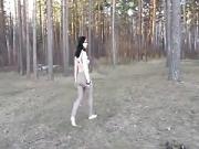 Liza naked and fingering in the forest