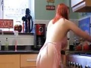 redhead white shaved pussy wears nothing but the apron at home
