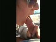 brunette Sucks And Swallows At The Beach