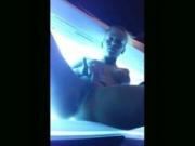 Busty teenie Rubs One Off In The Tanning Center