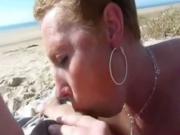 Milf Sucks Her Mans Cock On A Nude Beach