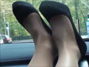 Look her feet and heels on dashboard
