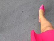 Hot pink pointed scarpins walking
