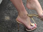 Toe showoff dangling gold sandals