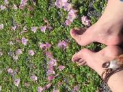 Rubbing feet together on beach