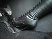 Black Stiletto Boots pumping gas pedal