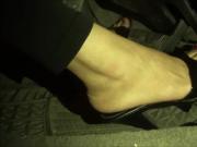 Sexy Woman's Feet In Sandals Play With Her Car's Pedals